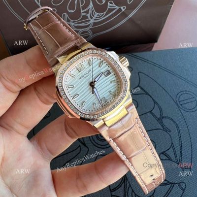 Swiss Quartz Patek Philippe Nautilus Women Replica Watch Pink Leather Strap